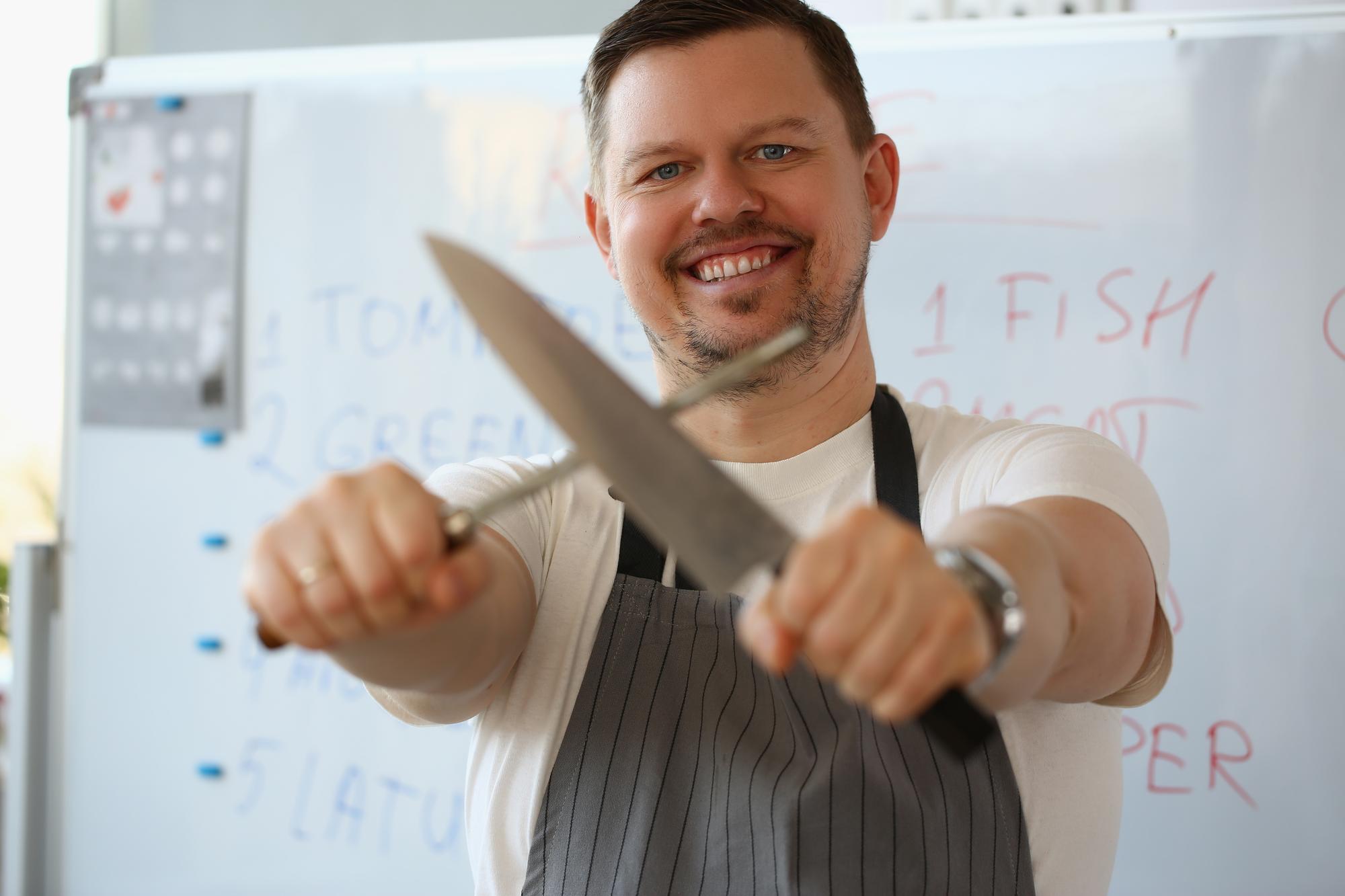 Instructor demonstrating knife skills